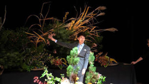 The Headmaster with the landscape arrangement at the finale